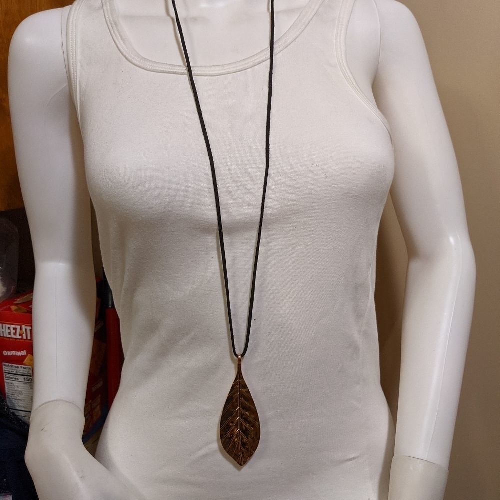 Golden leaf on strong cord necklace